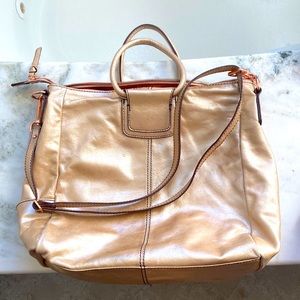 Hobo bag, metallic champagne gold.